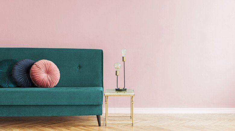 Pink Sofa with Emerald Green Accents