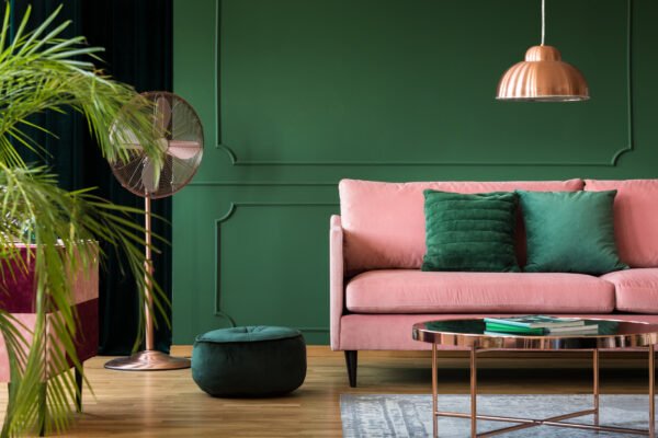 Pink Accents on Emerald Green Sofa
